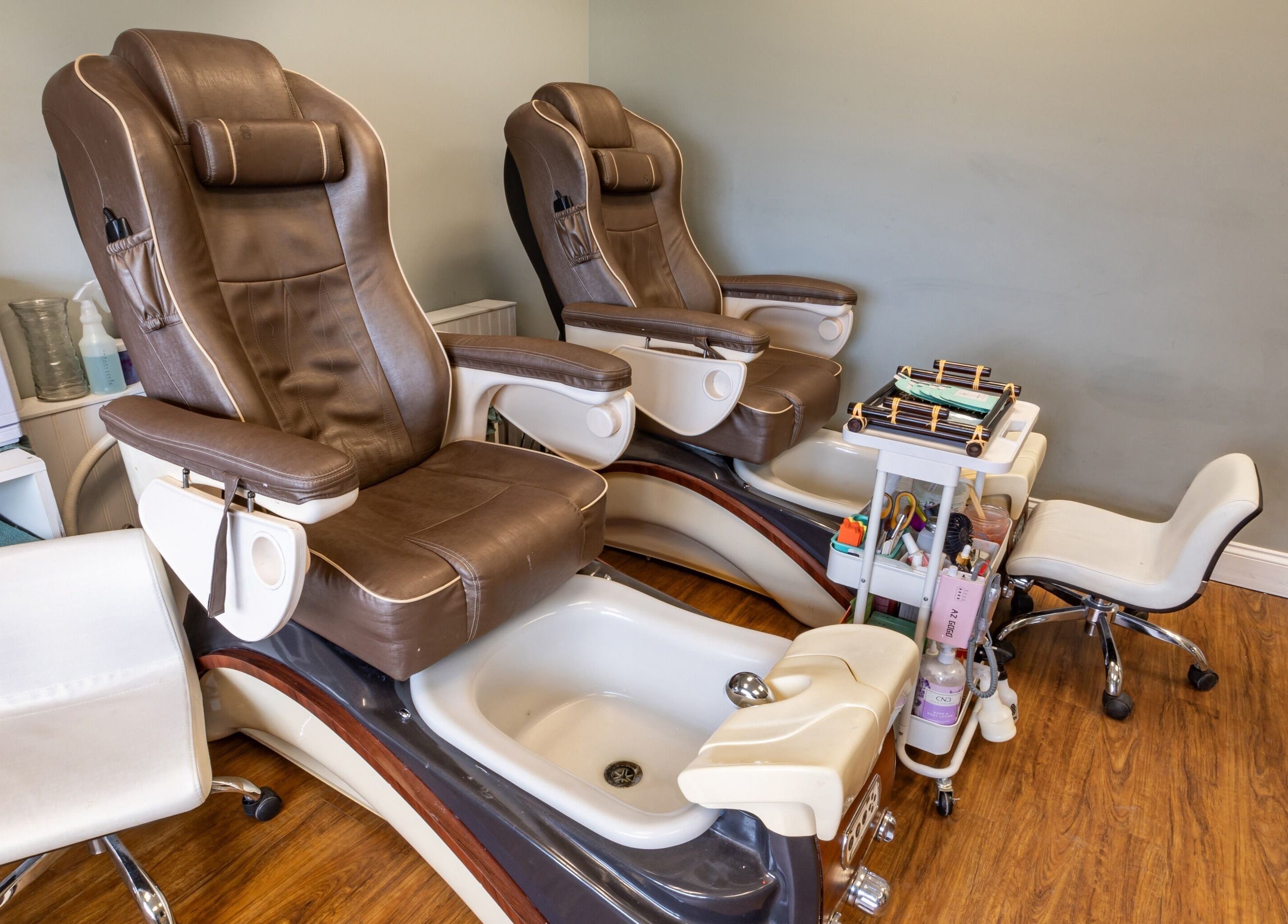Luxurious pedicure chairs at BEAUTYOLOGY, Ooltewah, Tennessee, US, offering ultimate relaxation.