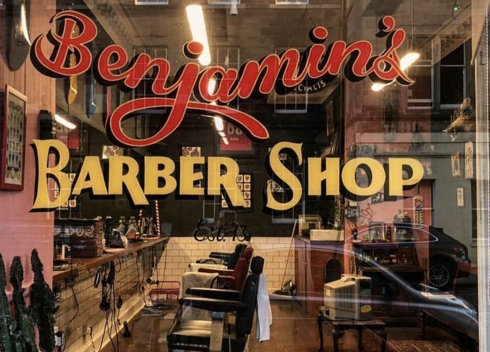 View of Benjamin’s Barber Shop in Edinburgh, Scotland, GB with retro interior design.