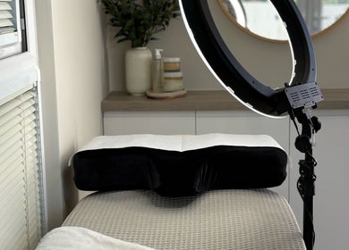 Massage bed and privacy setup at Charlotte Amelia Beauty, Penryn, England, GB.