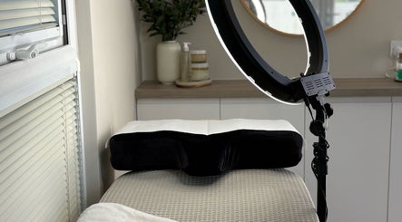 Massage bed and privacy setup at Charlotte Amelia Beauty, Penryn, England, GB.