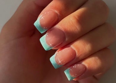 Elegant aqua nail design at Charlotte Amelia Beauty, Penryn, England, GB. Perfect for a chic and stylish look.