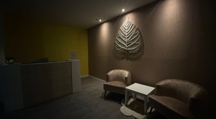 Inviting reception area at Laanna Spa Valkenburg, Valkenburg, Limburg, NL, with cozy seating and elegant decor.