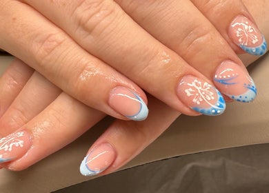 Elegant blue floral nail art at HUTT Beauty, Ballycastle, Northern Ireland, GB.