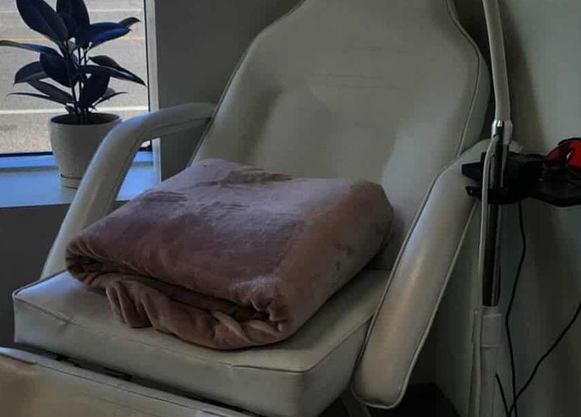 Relaxing treatment chair at The Lash Co., Windsor, Ontario, CA, inviting tranquility and comfort.