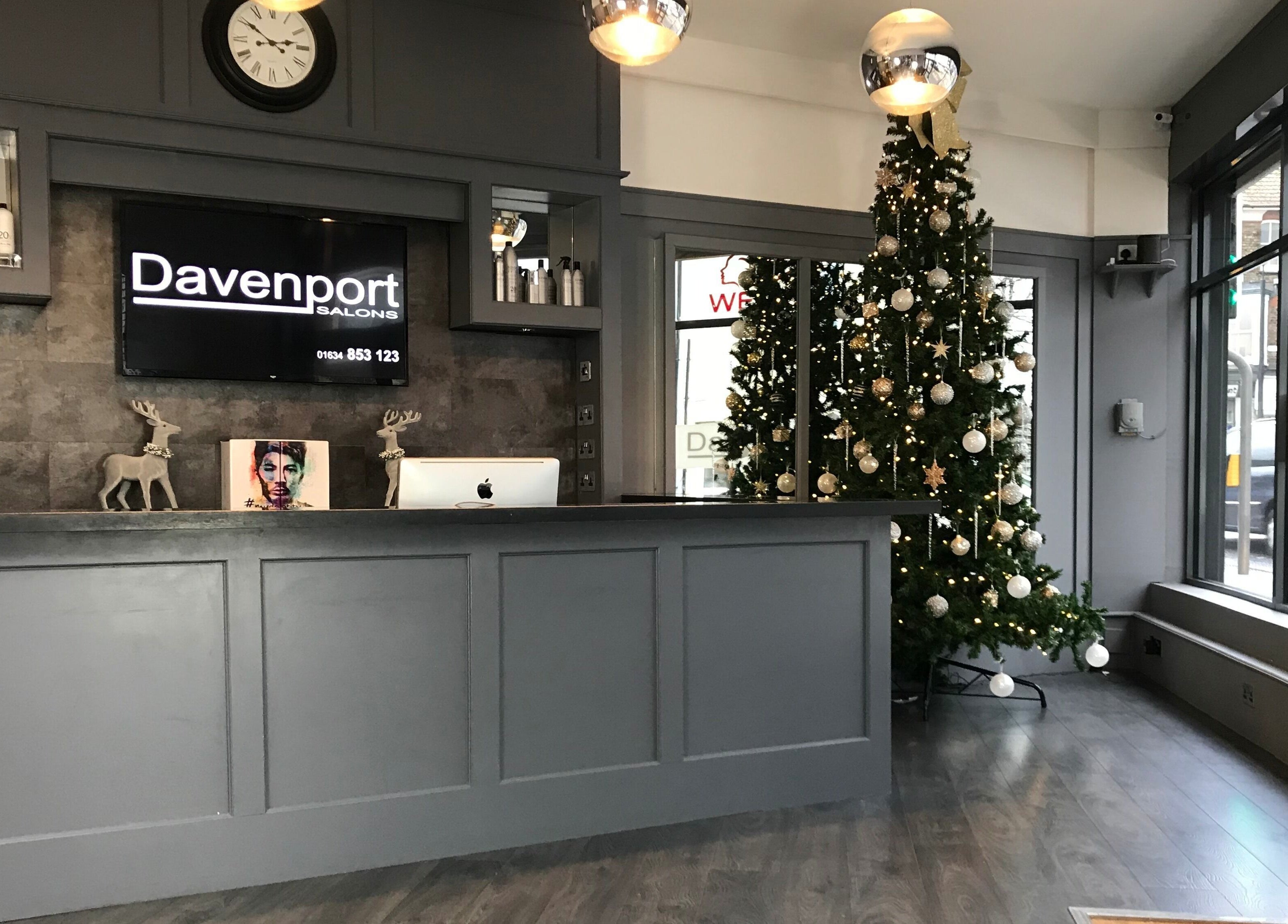 Elegant reception at Davenports, Carmichael Chatham, Chatham, England with a Christmas tree and modern decor.