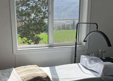 Relaxing treatment room view at Lashes by Alicia, Kamloops, British Columbia, CA with lush greenery.