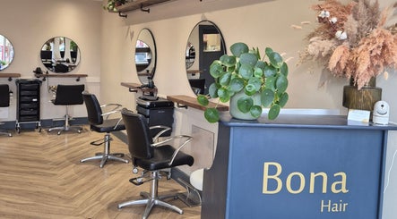 Stylish interior of Hair by Brown @ Bona in Edinburgh, Scotland, GB, showcasing modern salon setup and decor.