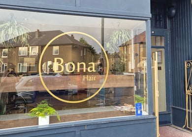 Front view of Hair by Brown @ Bona, a modern salon in Edinburgh, Scotland, GB with stylish signage.