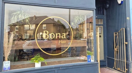 Front view of Hair by Brown @ Bona, a modern salon in Edinburgh, Scotland, GB with stylish signage.
