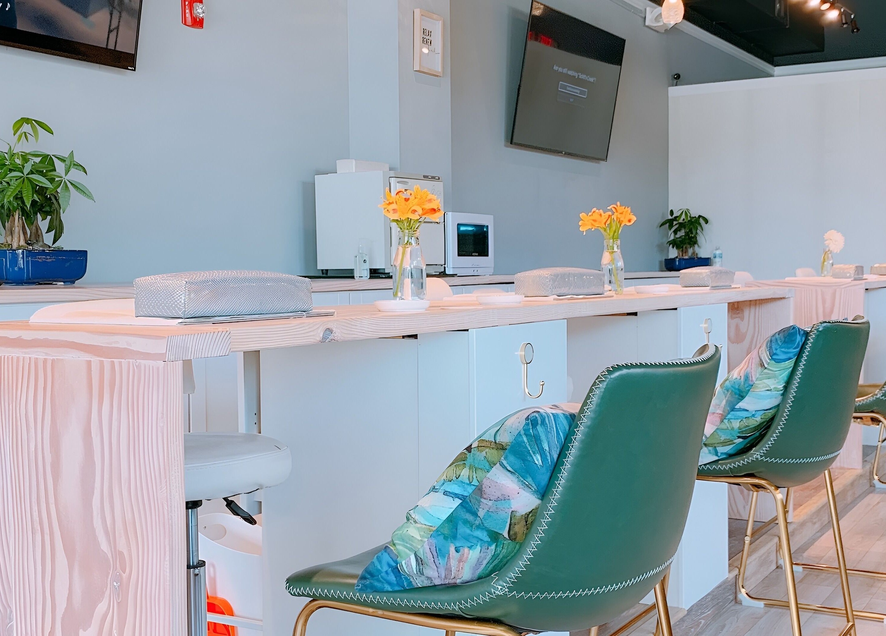 Elegant manicure station at NailBar Studio, Naperville, IL, US with stylish decor and comfortable seating.