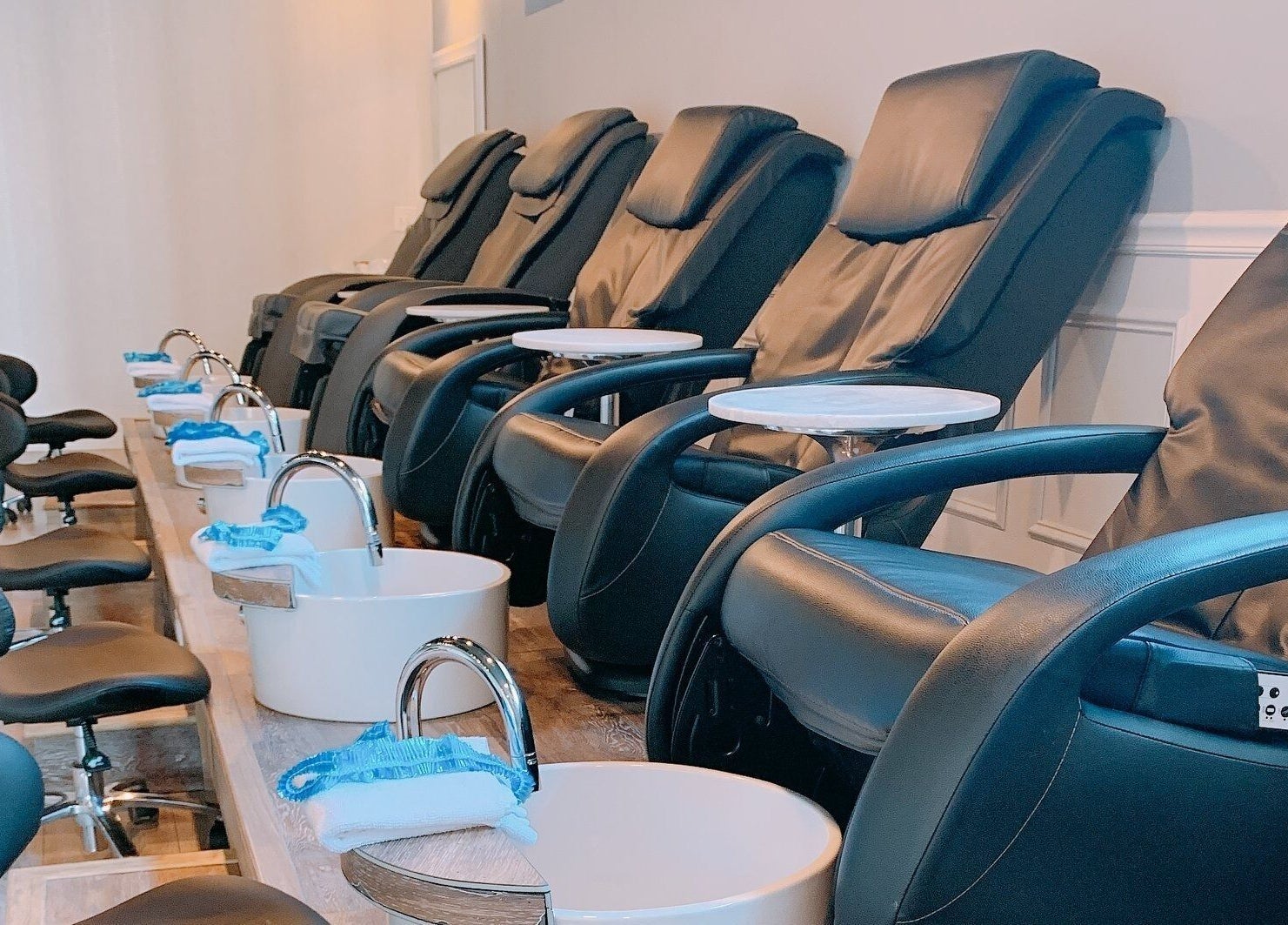 Luxurious pedicure chairs at NailBar Studio, Naperville, IL, US, ready for ultimate foot pampering.