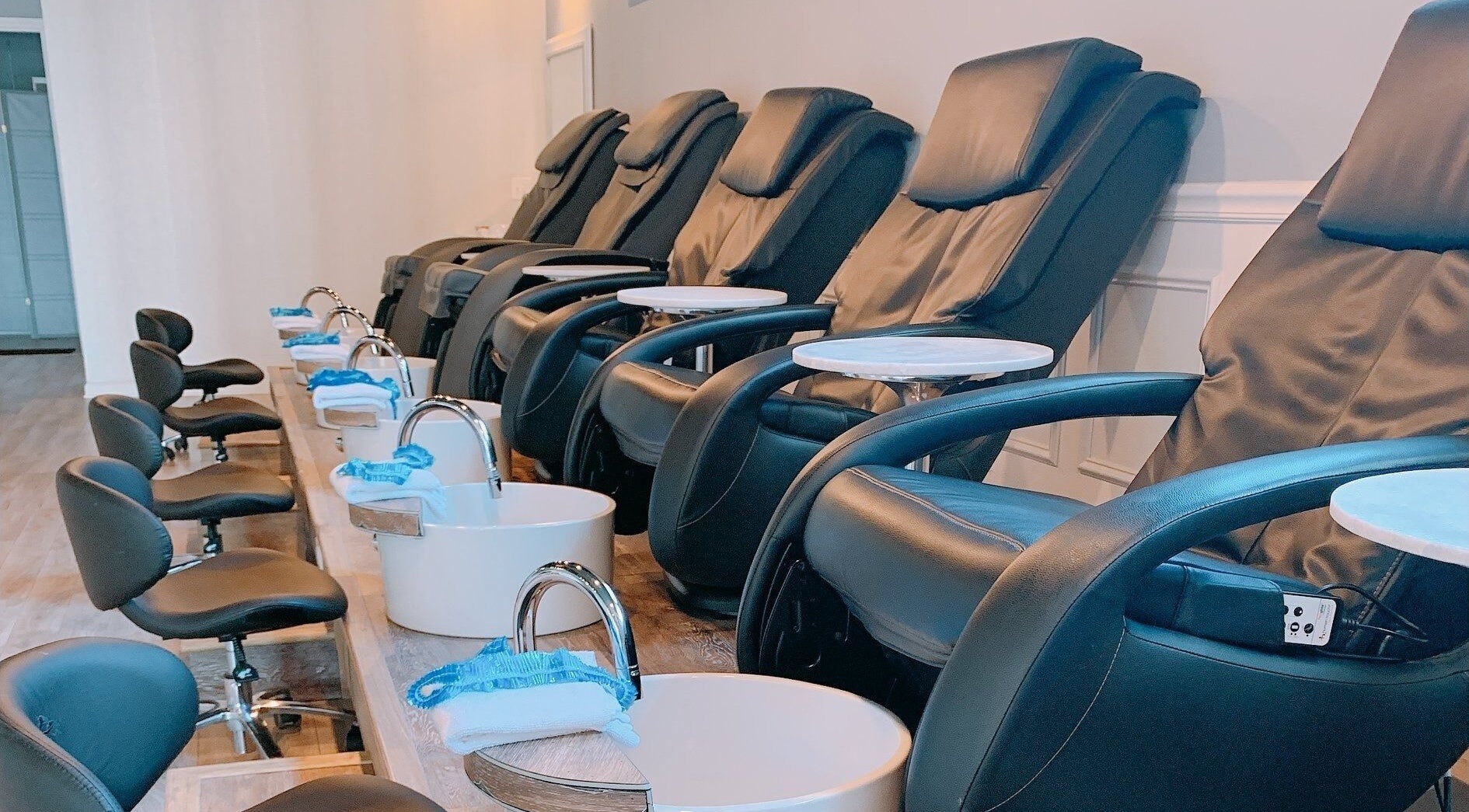 Luxurious pedicure chairs at NailBar Studio, Naperville, IL, US, ready for ultimate foot pampering.