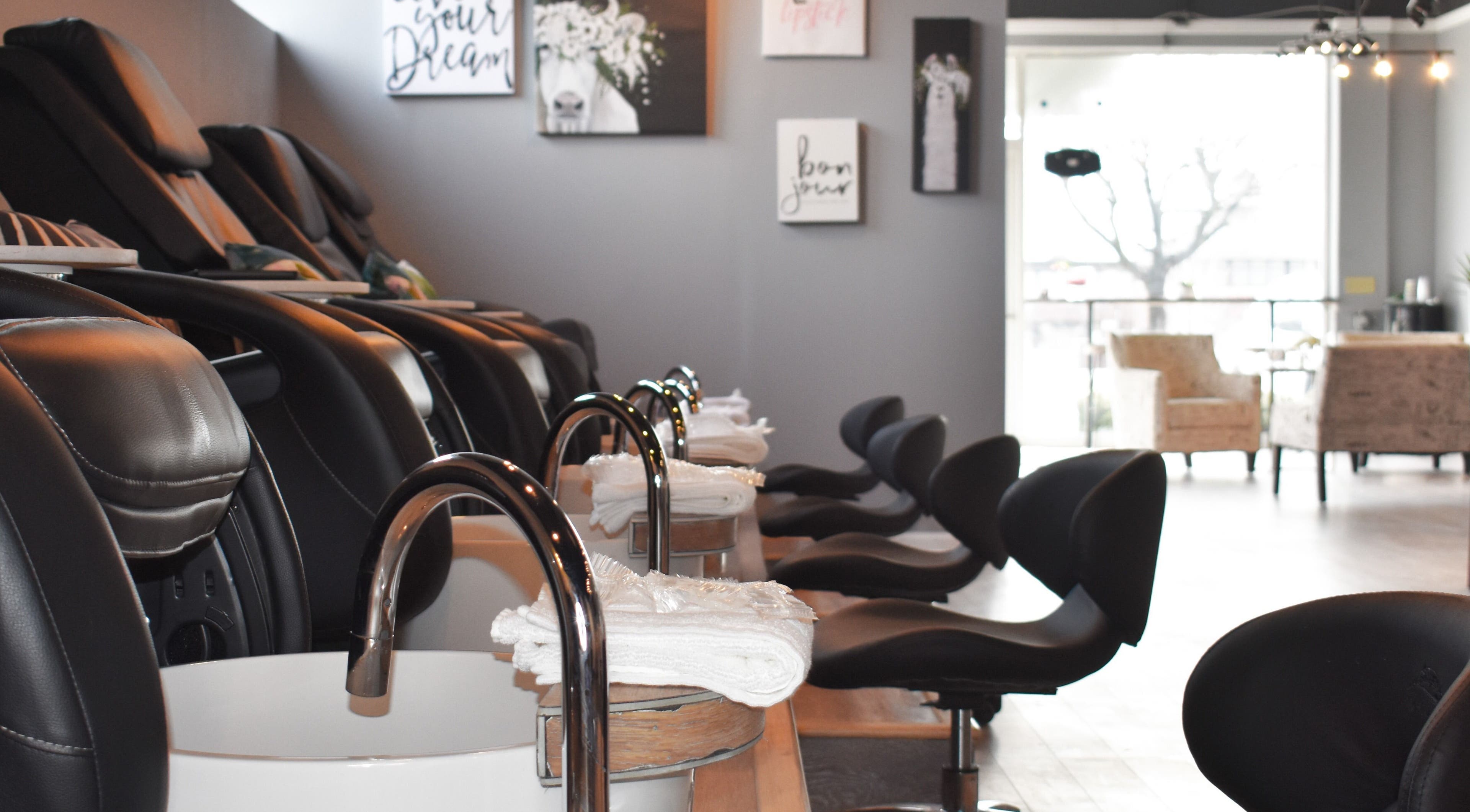 Upscale pedicure stations at NailBar Studio in Naperville, IL, US, showcasing modern elegance and comfort.