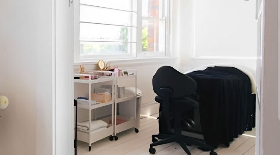 Serene therapy room at Sheina Mill Studio, Bondi Beach, New South Wales, AU with massage table.