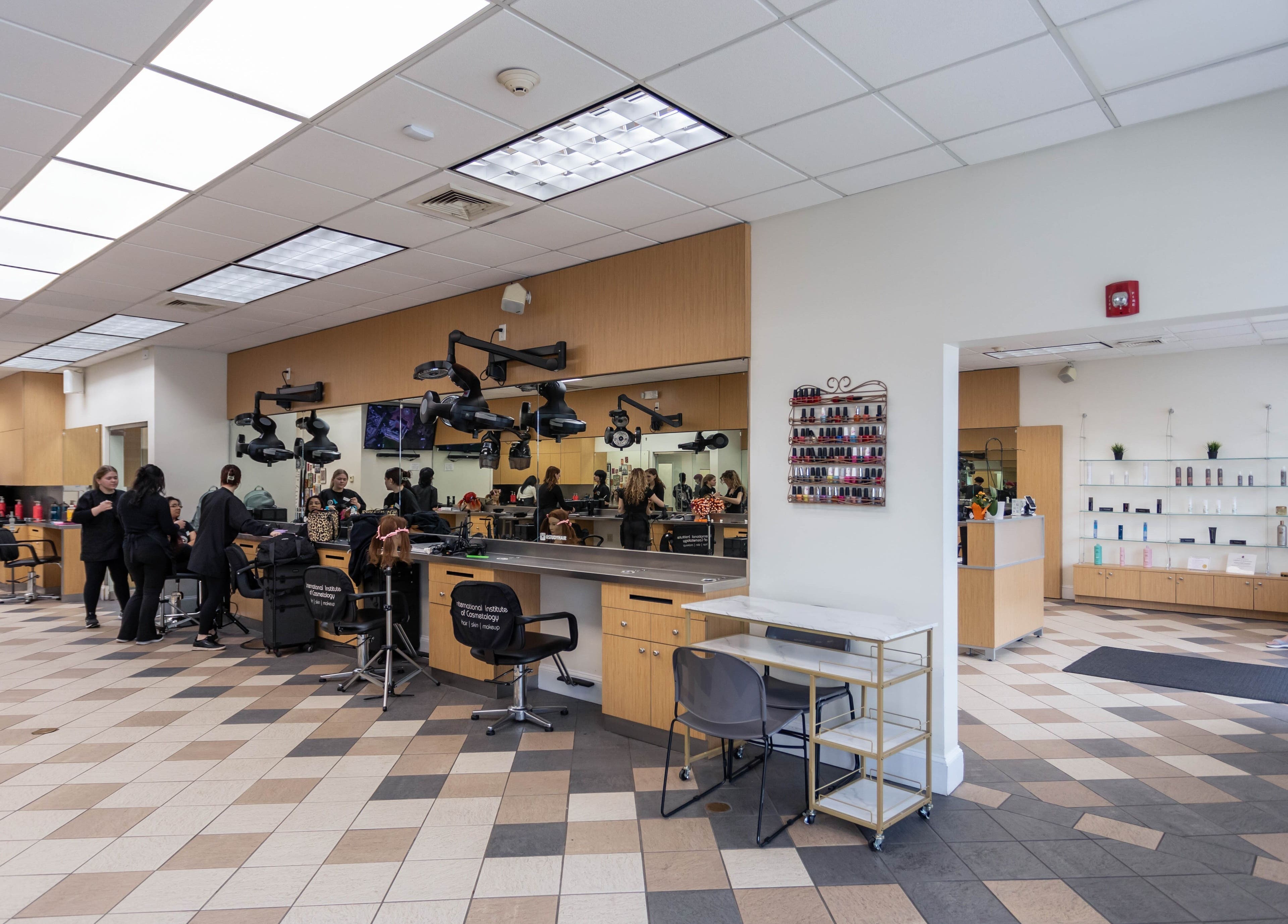 Modern salon at IIC Wethersfield showcasing styling stations and product shelves, Wethersfield, Connecticut, US.