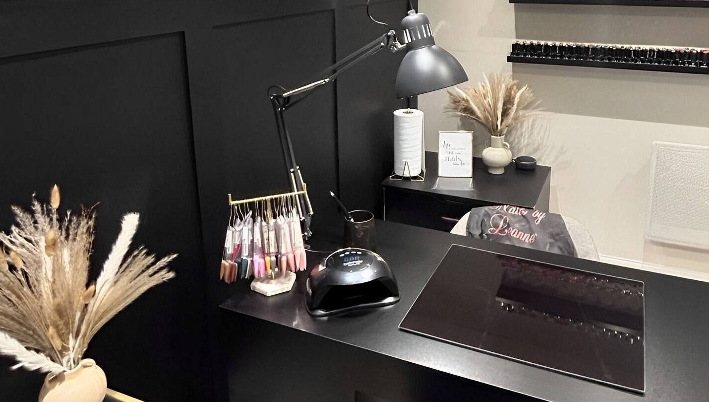 Elegant nail studio at Nails By Leanne, Leyland, England, GB, with modern decor and nail polish display.