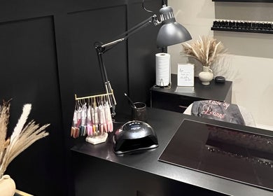 Elegant nail studio at Nails By Leanne, Leyland, England, GB, with modern decor and nail polish display.
