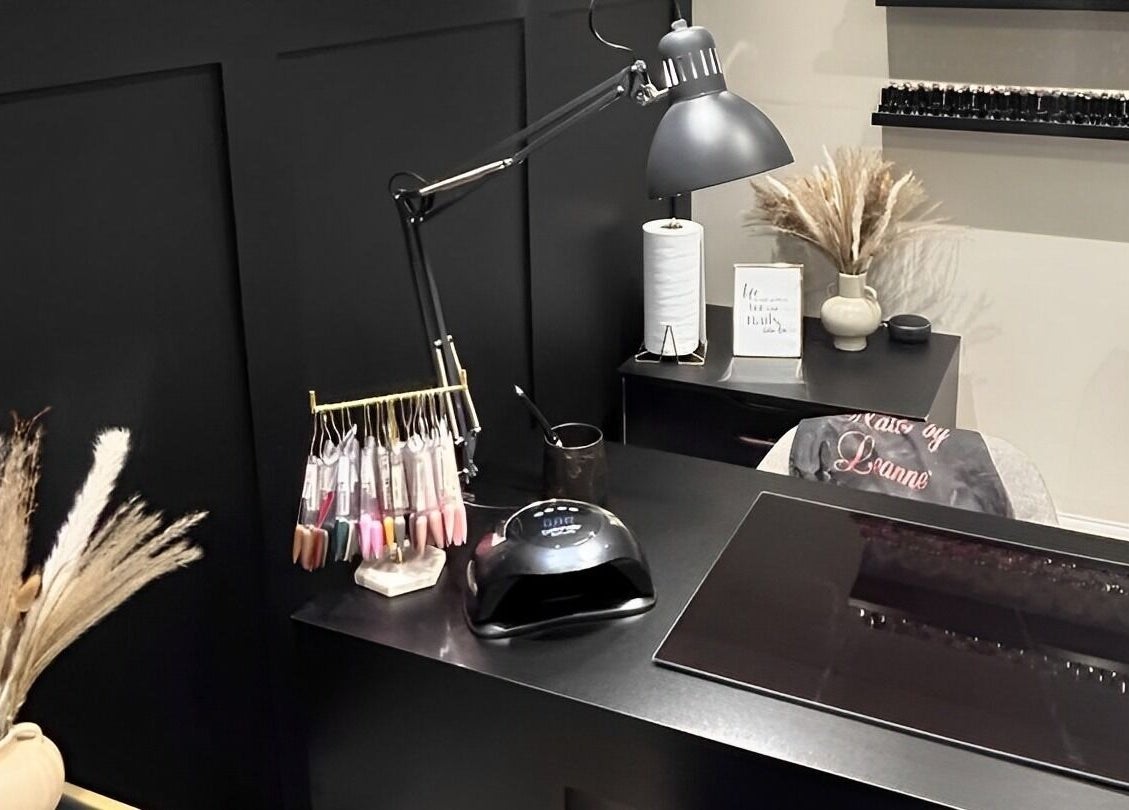 Elegant nail studio at Nails By Leanne, Leyland, England, GB, with modern decor and nail polish display.