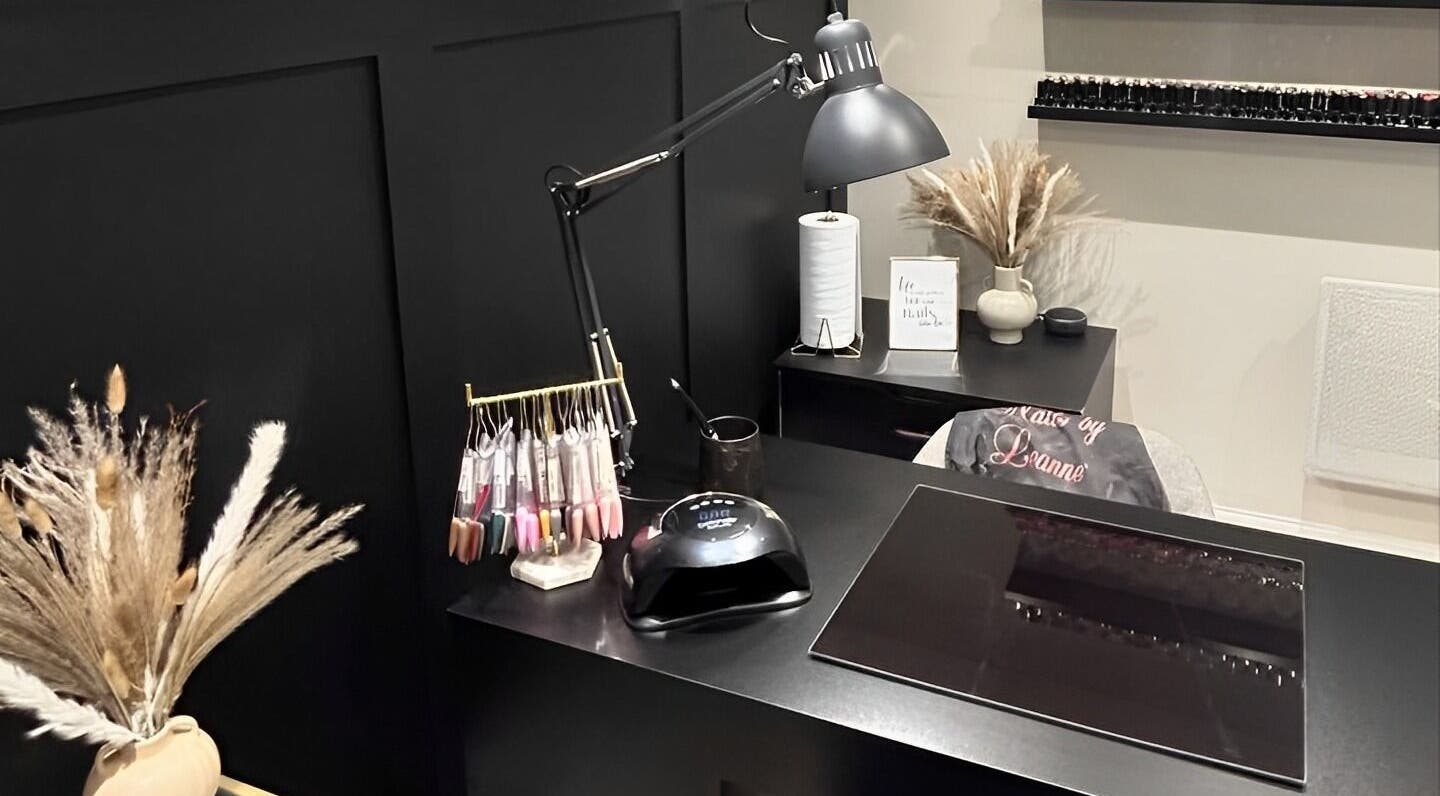 Elegant nail studio at Nails By Leanne, Leyland, England, GB, with modern decor and nail polish display.