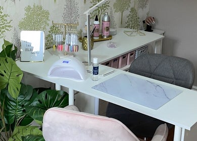 Elegant nail station at Nails By Leanne, Leyland, England, GB, with lush greenery and stylish decor.
