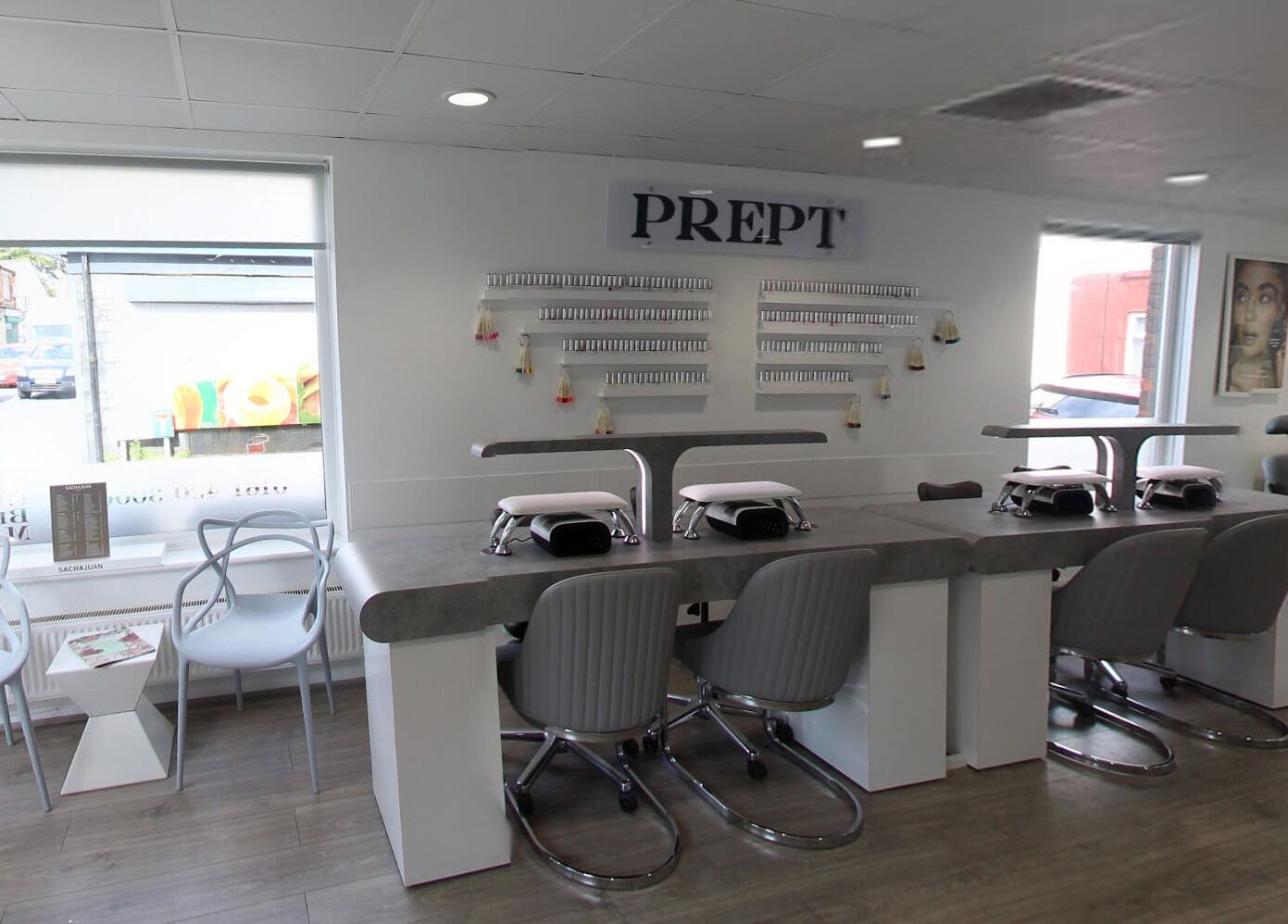 Modern nail salon at Prept Romiley in Romiley, England, GB featuring stylish seating and manicure stations.
