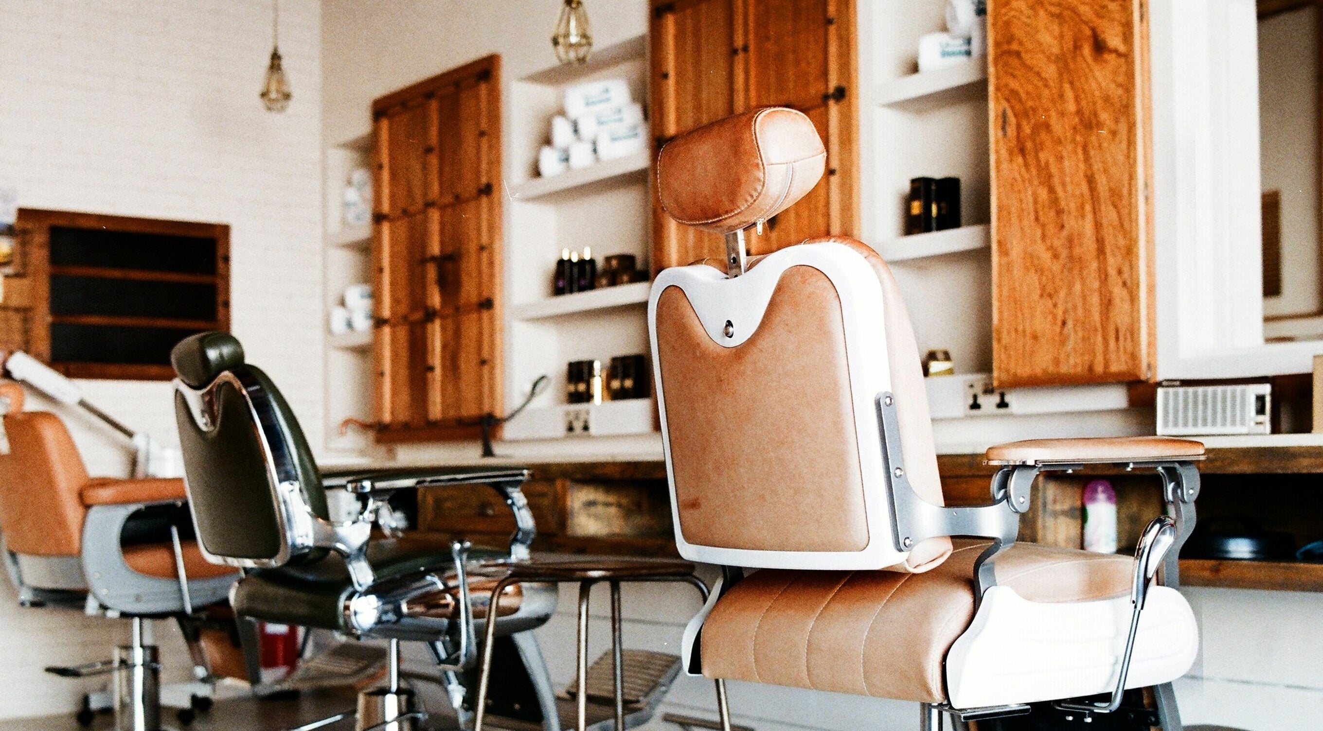 Luxurious barbershop chairs at Al Shanab Gents Salon, Dubai, Dubai, AE, offering premium grooming services.