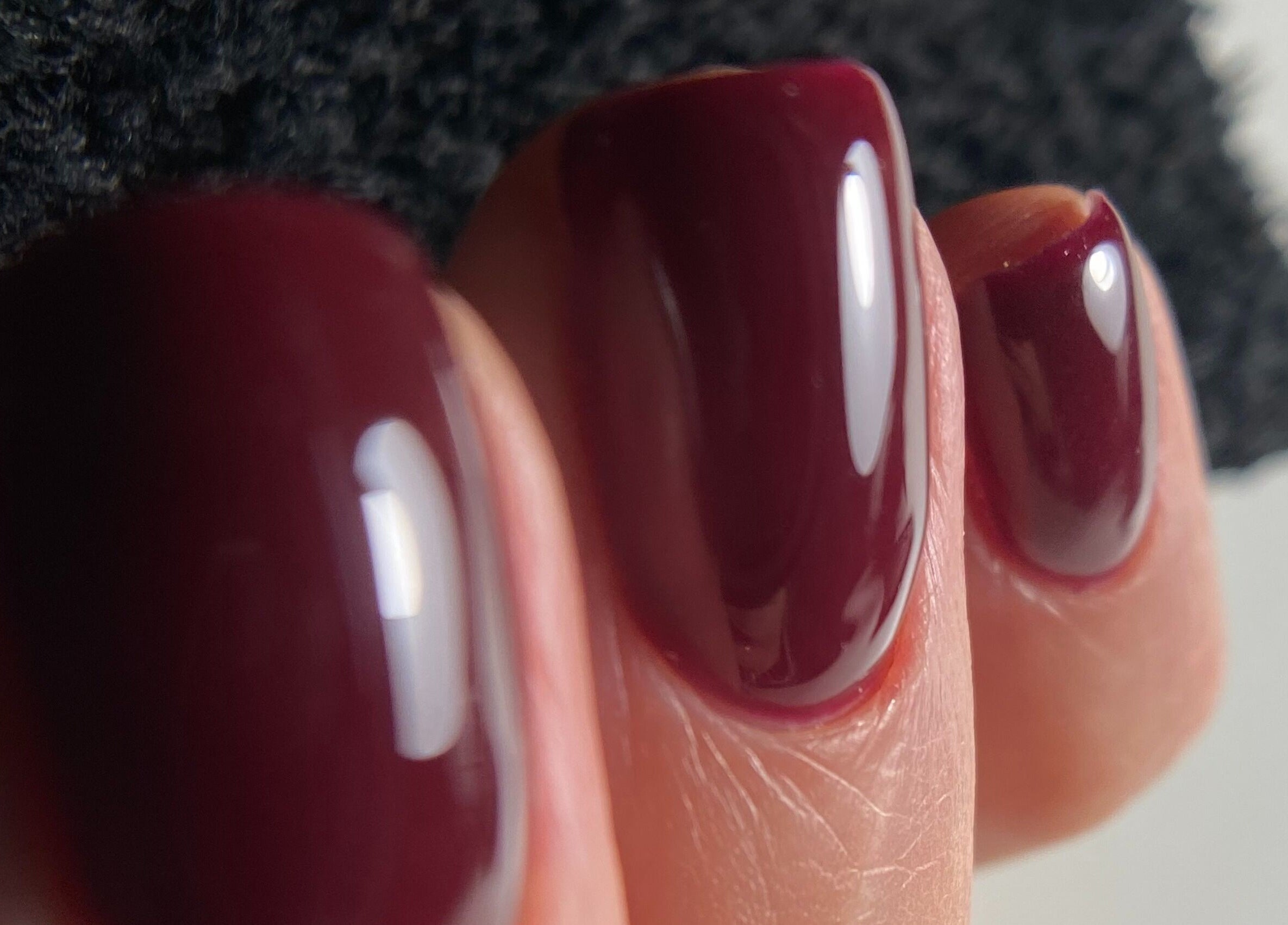 Elegant burgundy manicure at Endorphine Haarlem, located in Haarlem, Noord-Holland, NL.