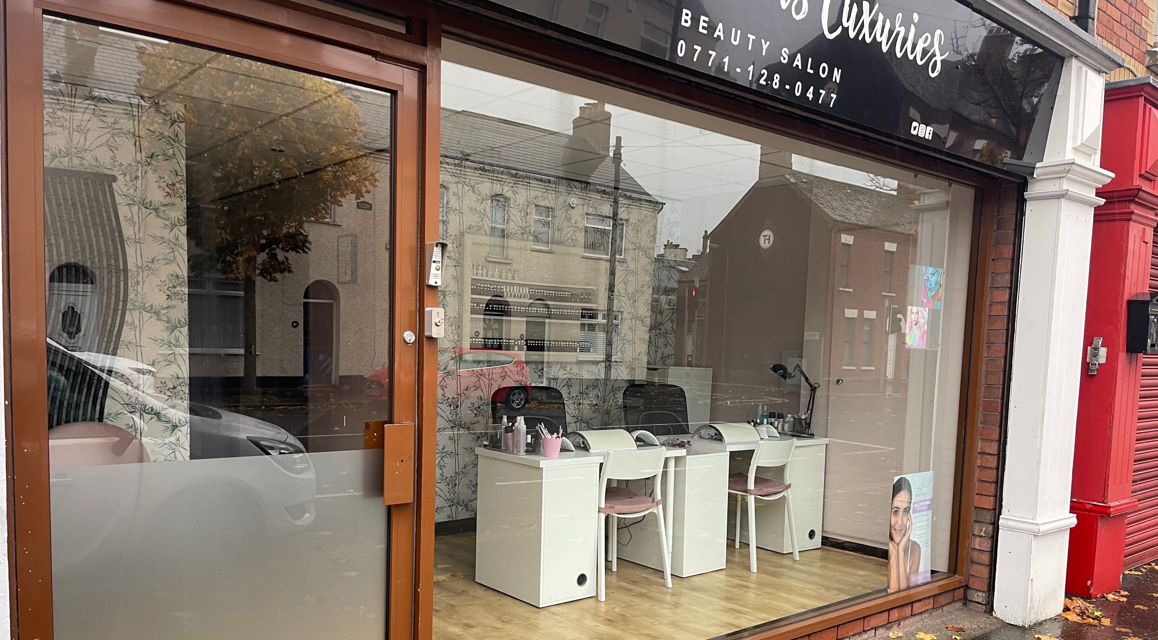 Elegant Lushious Luxuries storefront in Belfast, Northern Ireland, GB showcasing modern beauty salon interior.