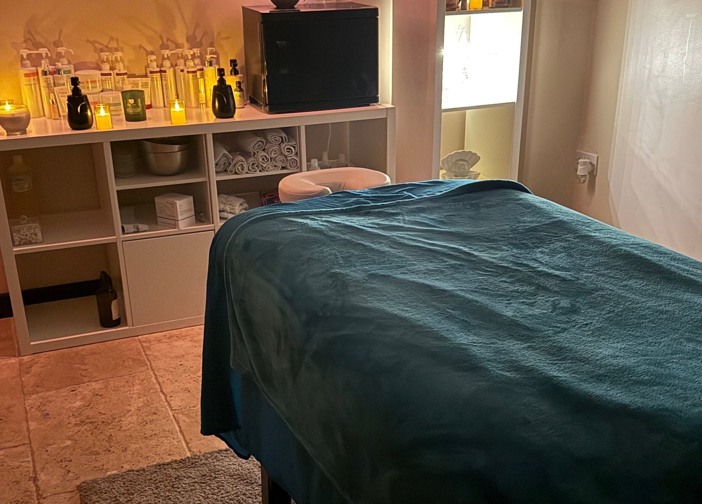 Tranquil massage room at Lushious Luxuries Day Spa, Belfast, Northern Ireland, GB with a cozy ambiance.