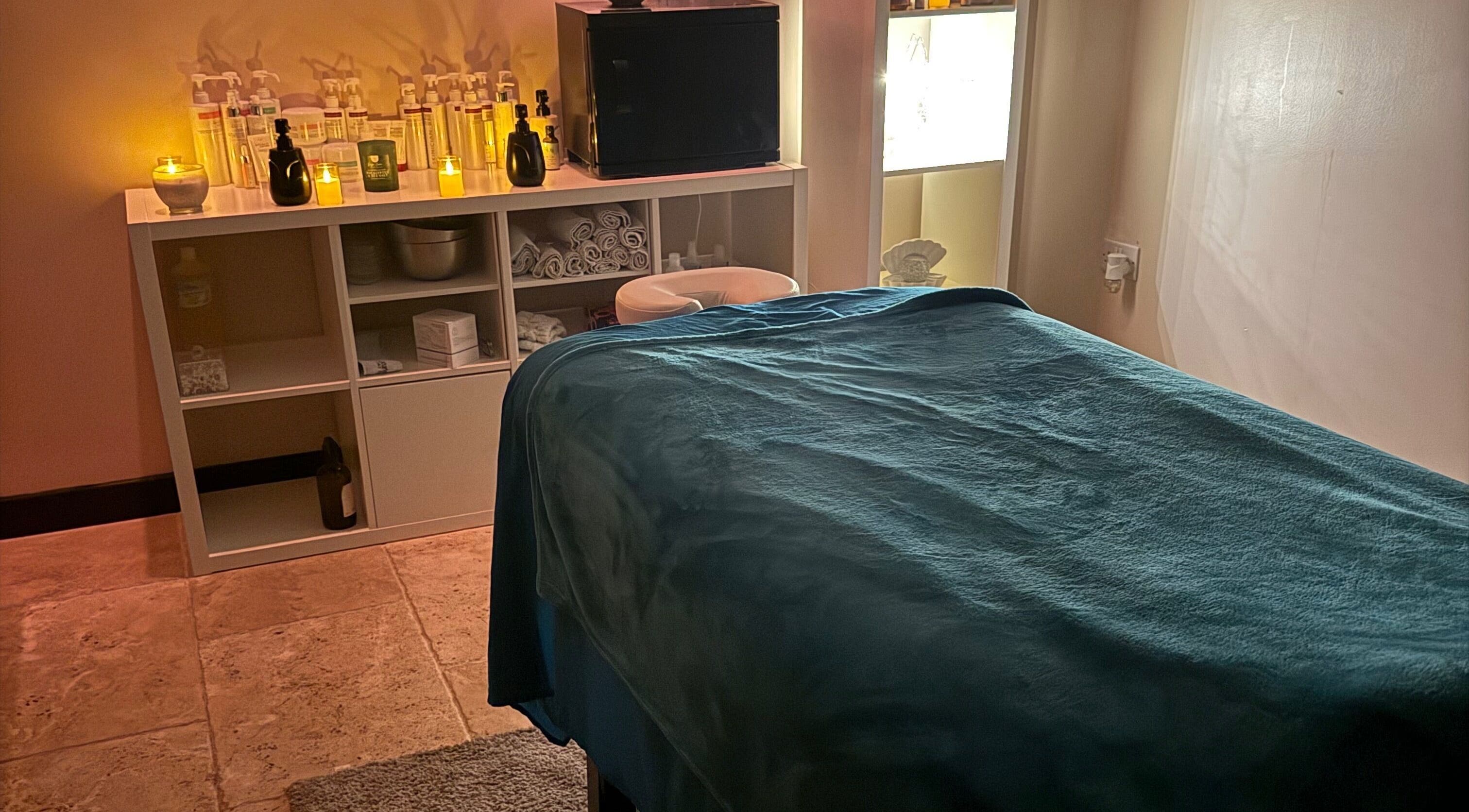 Tranquil massage room at Lushious Luxuries Day Spa, Belfast, Northern Ireland, GB with a cozy ambiance.