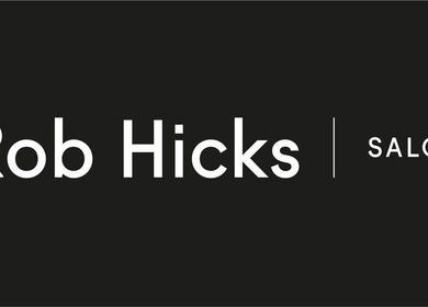 Elegant Rob Hicks Salon logo in black and white, Cheltenham, England, GB.
