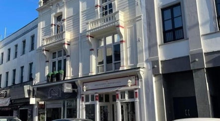 Front view of Hollie’s on Beresford Street, Jersey, GB featuring a stylish exterior.