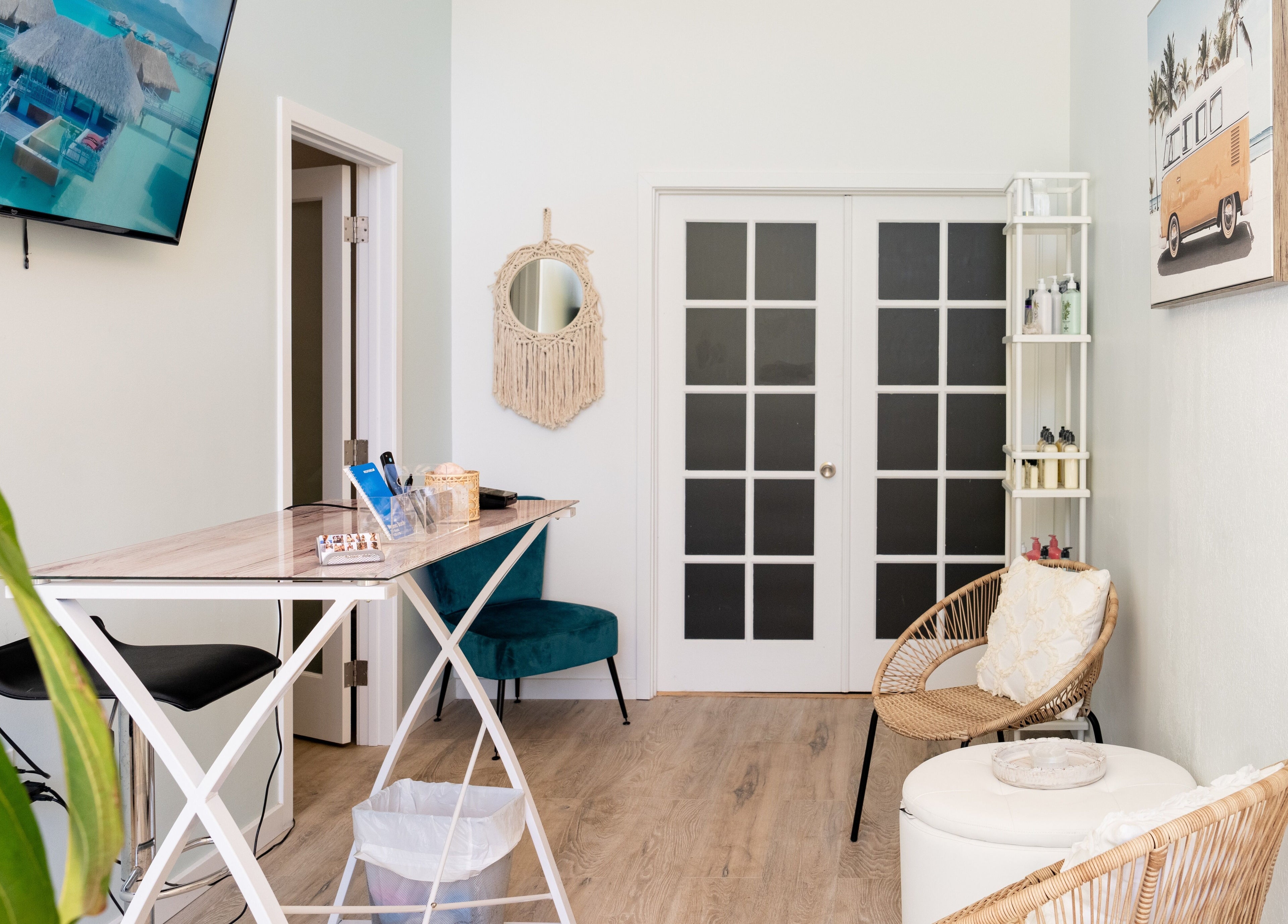 Inviting seating area at Elisha Marie Skin & Body, Palo Alto, California, US with wicker chairs and modern decor.