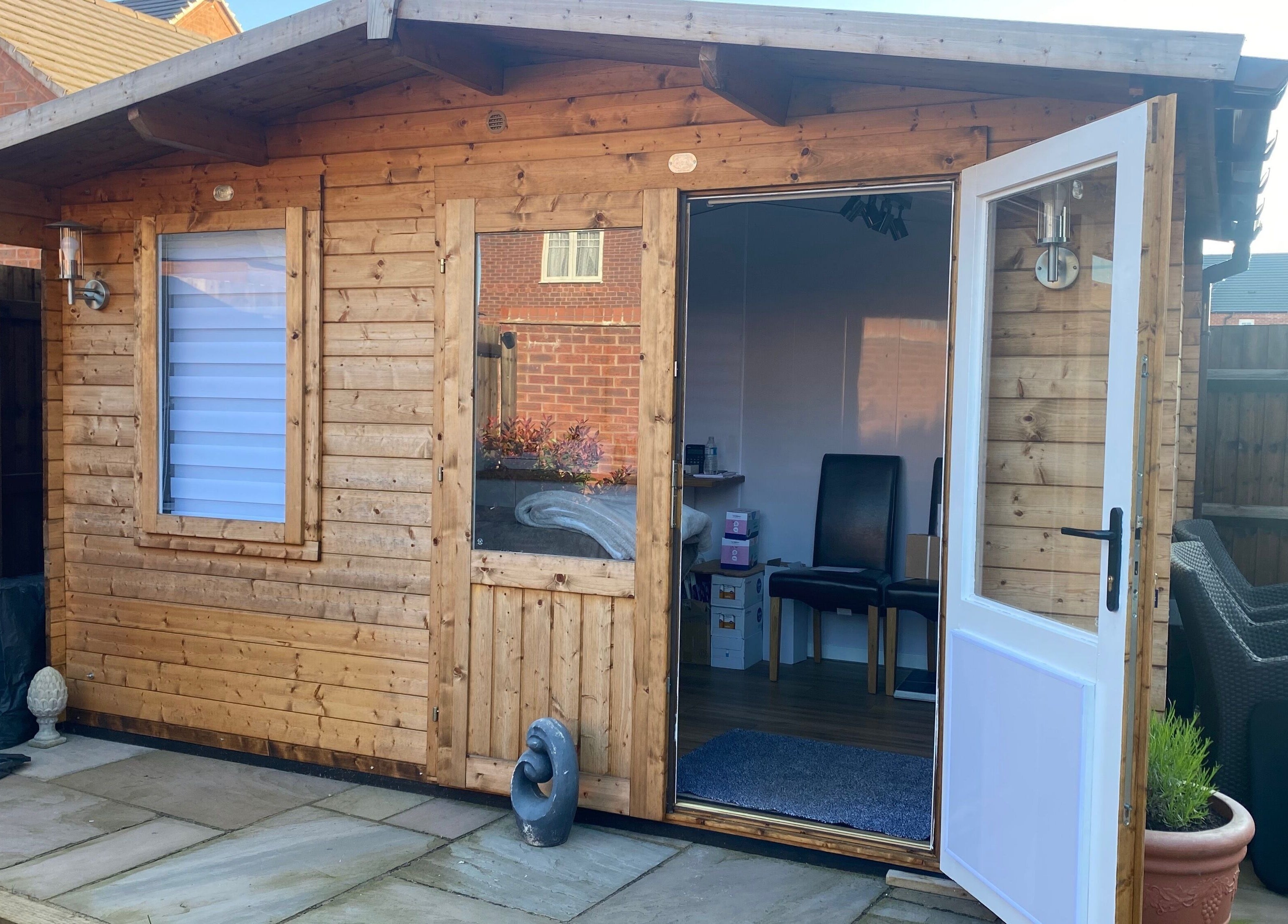 Cozy exterior of The Beauty Cabin in Swadlincote, England, GB offering a welcoming wellness space.