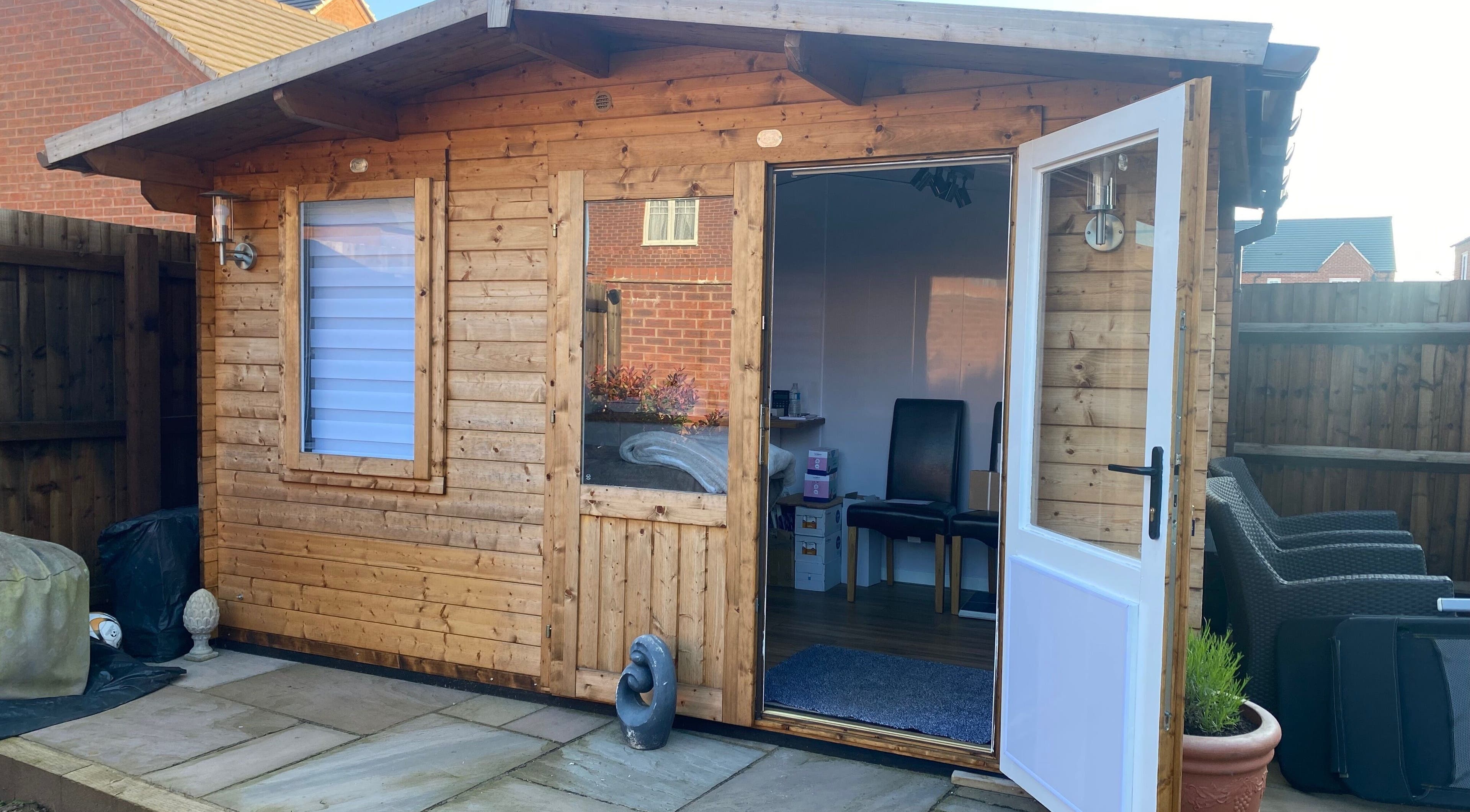 Cozy exterior of The Beauty Cabin in Swadlincote, England, GB offering a welcoming wellness space.