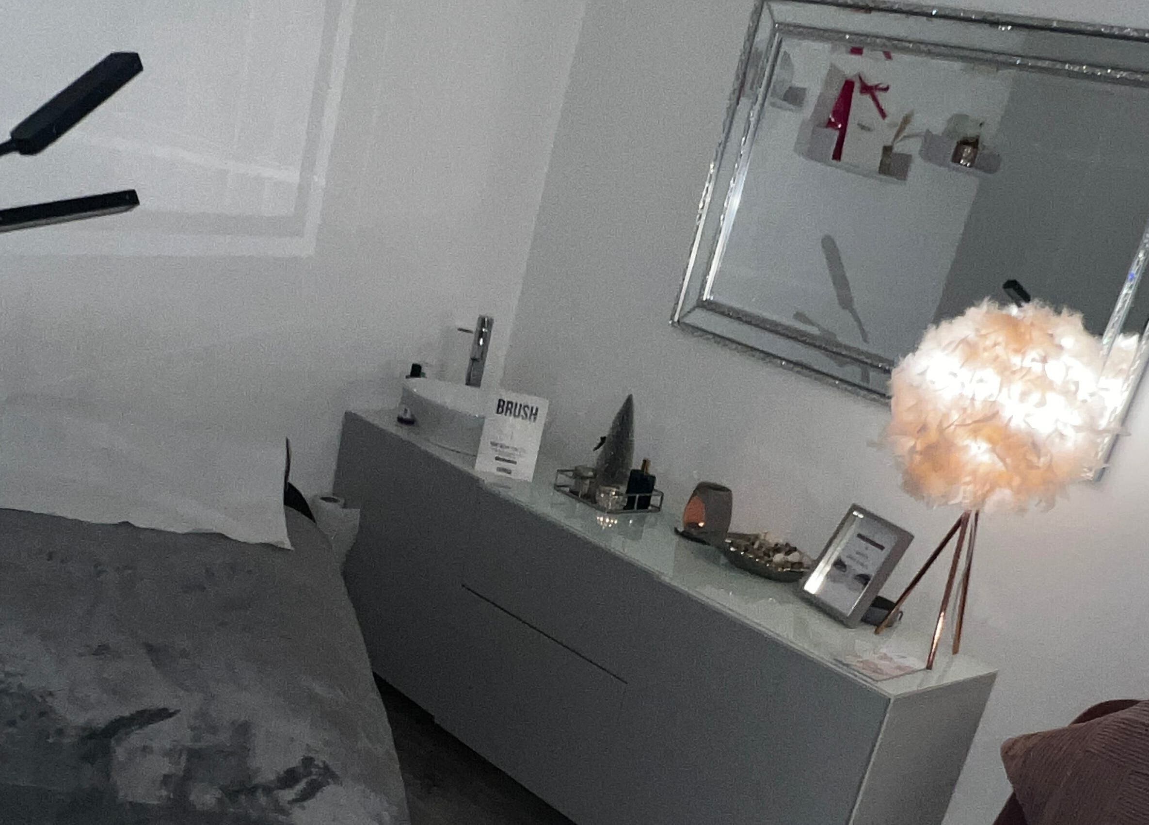 Cozy treatment room at Salon Twenty9, Kimberley, England, GB with a plush bed and stylish lamp.