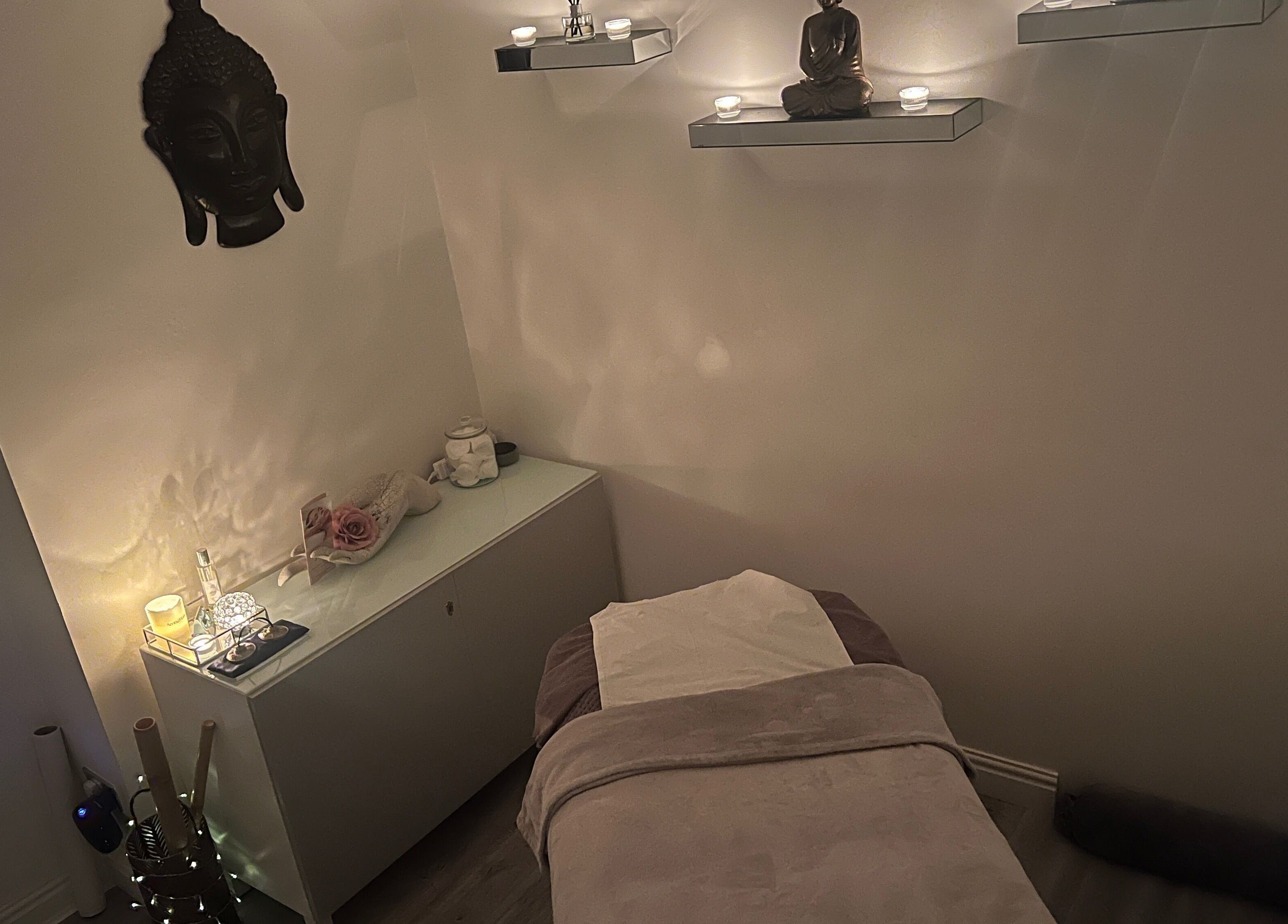 Tranquil treatment room at Salon Twenty9, Kimberley, England, GB with calming decor and massage table.