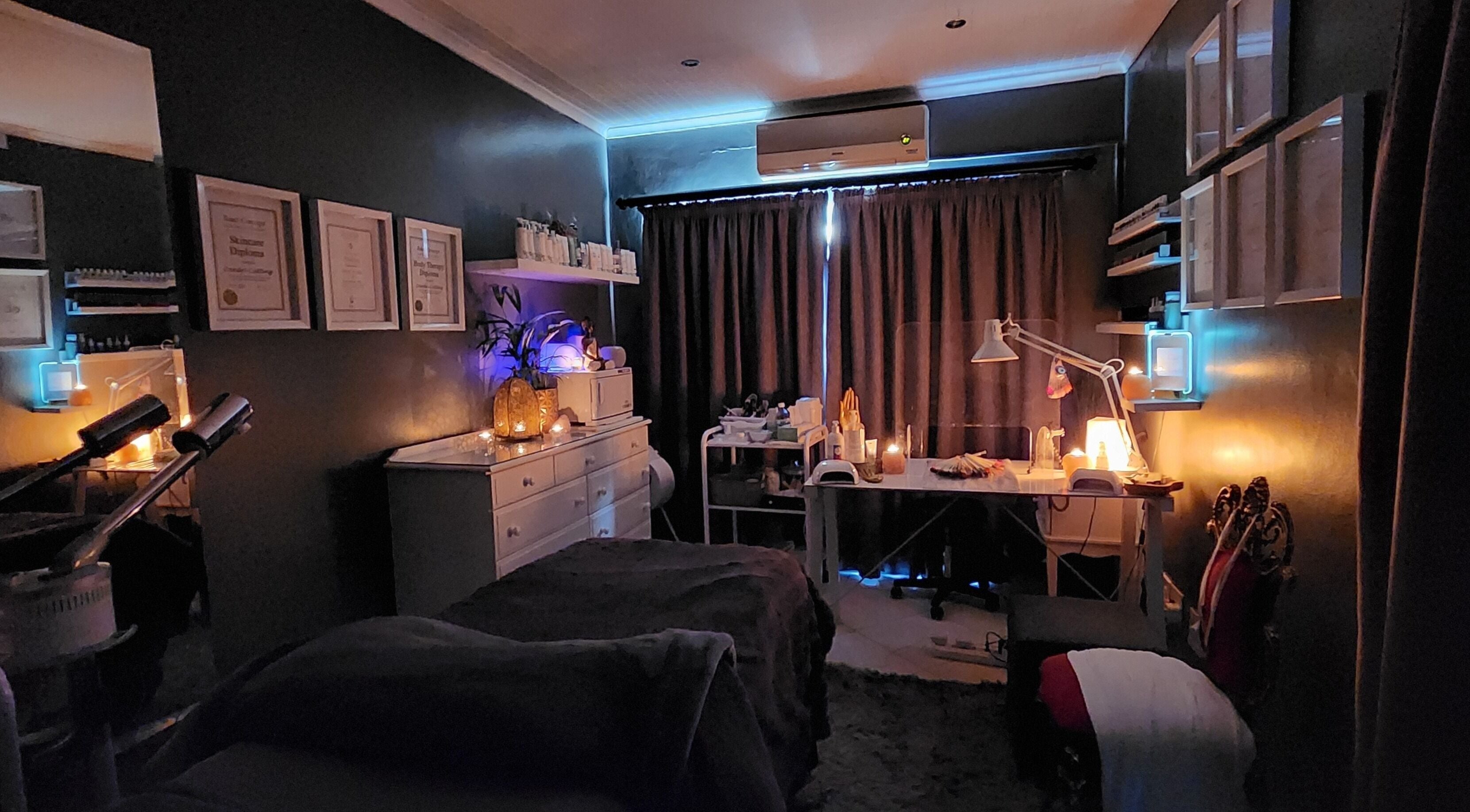 Relaxing interior of The 432 Holistic Beauty Studio in Gqeberha, Eastern Cape, ZA with soft lighting and cozy decor.
