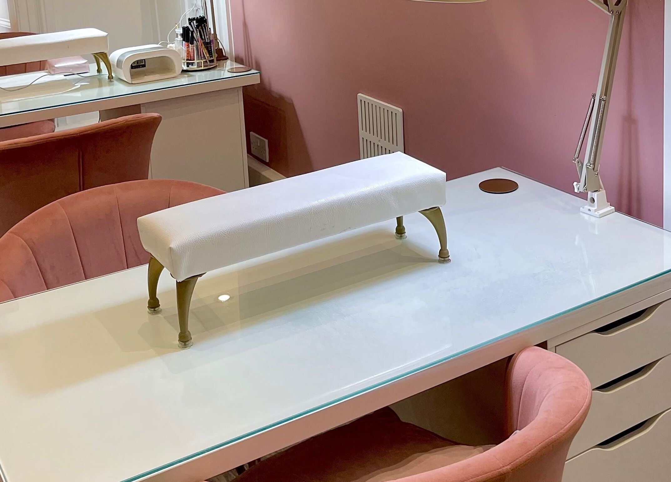 Elegant manicure setup at Totally Polished Tadcaster, Tadcaster, England, GB with plush seating.