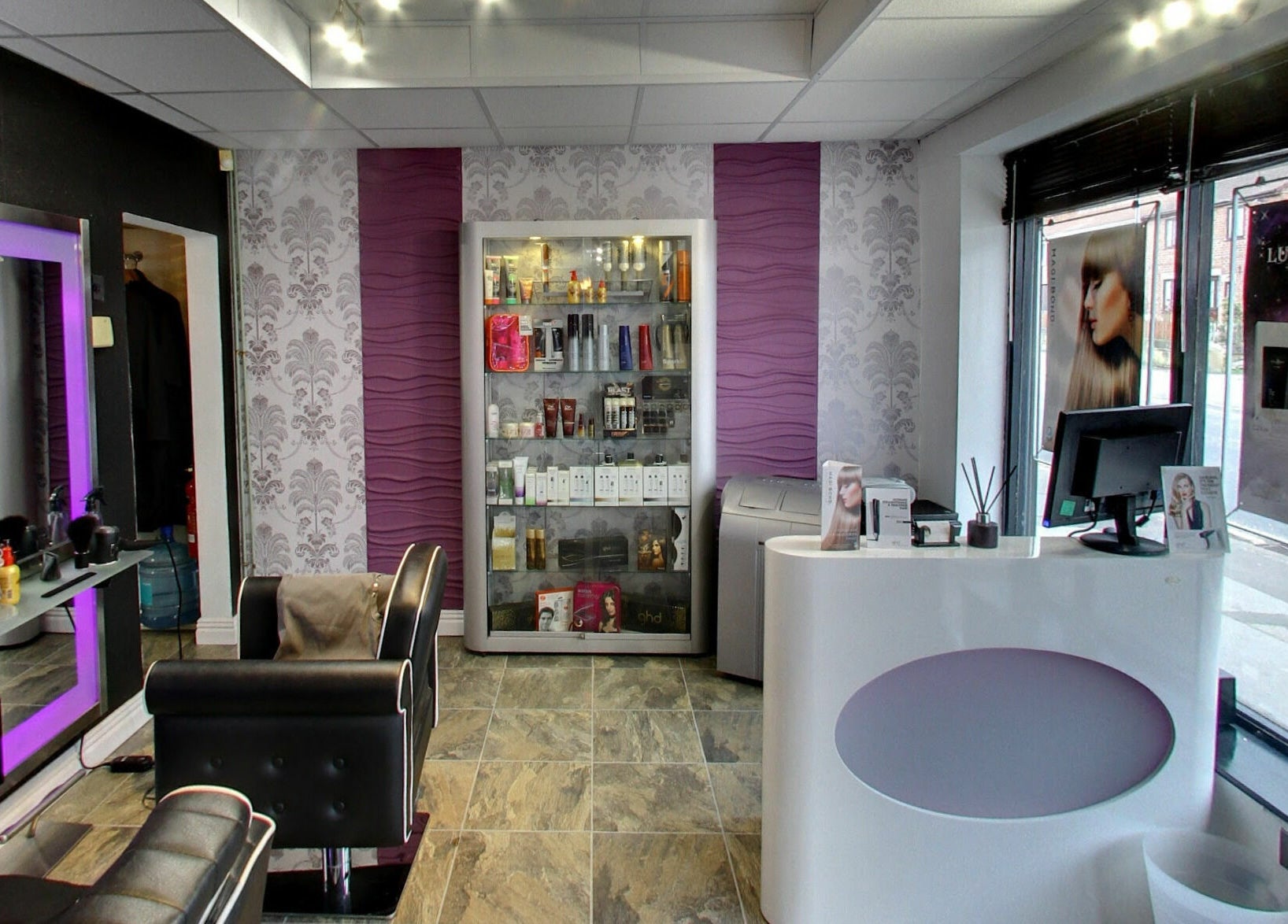 Chic beauty salon interior at Masson's, Maltby, England, GB with stylish decor and modern salon equipment.