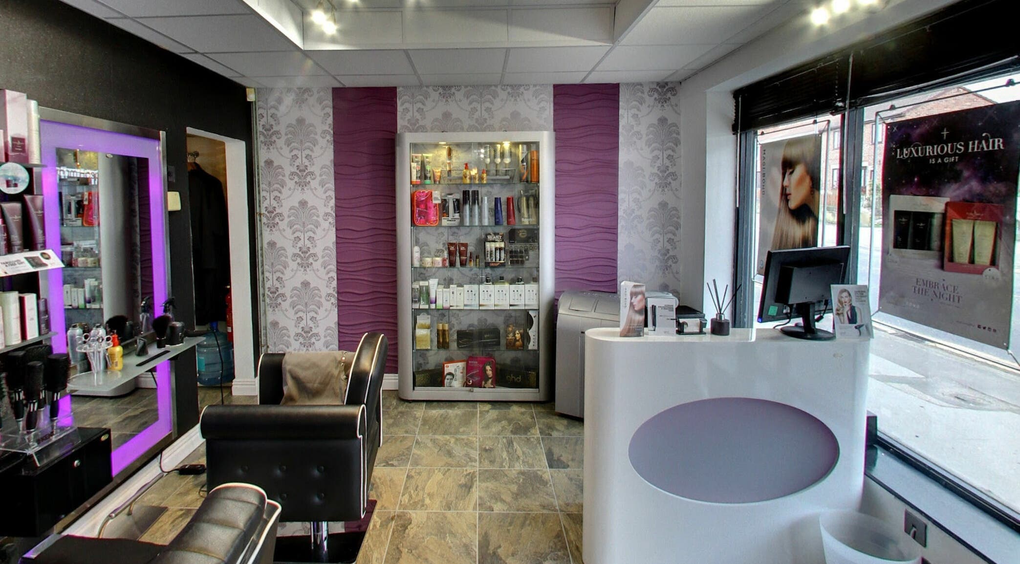 Chic beauty salon interior at Masson's, Maltby, England, GB with stylish decor and modern salon equipment.
