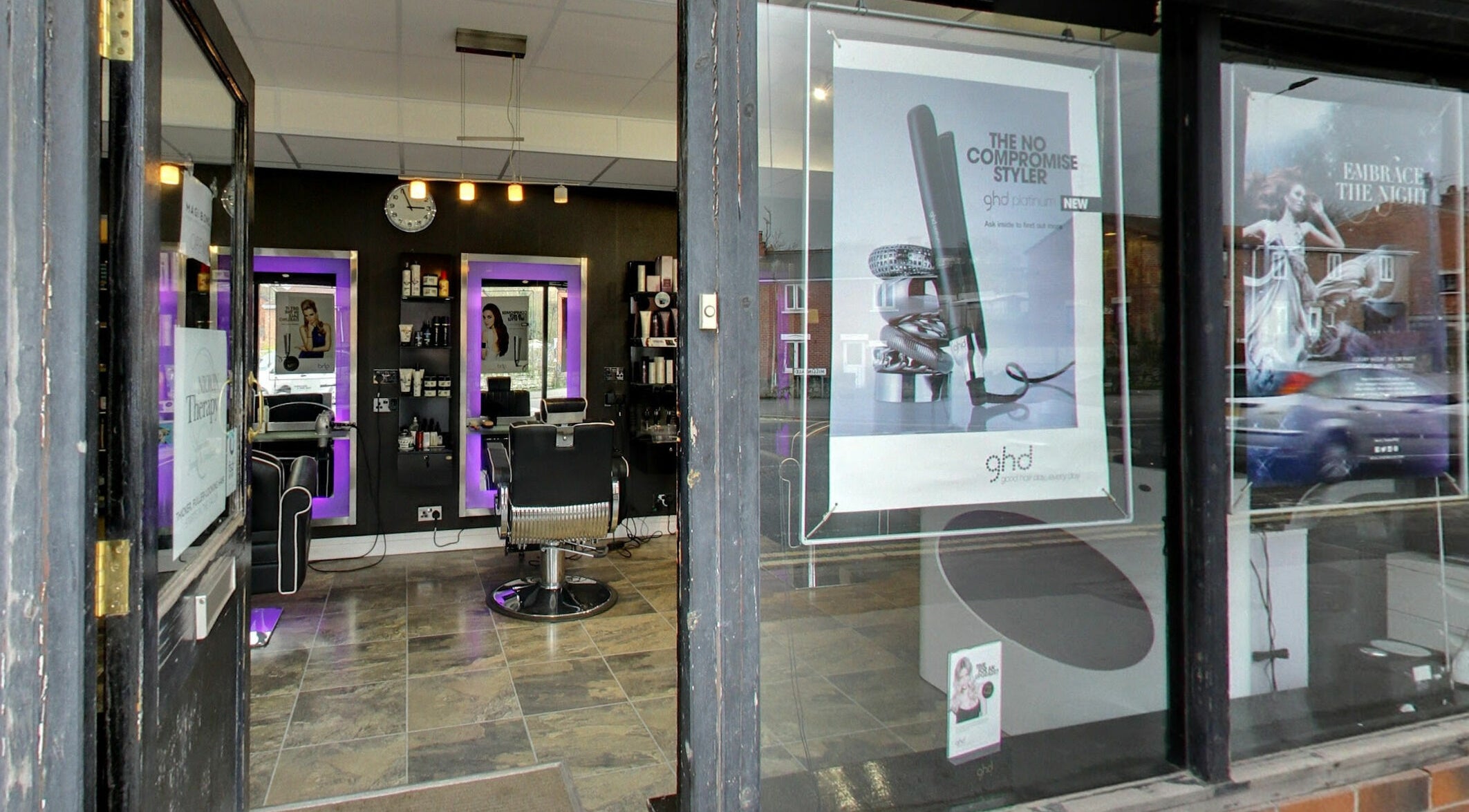 Masson's chic interior view from the entrance in Maltby, England, GB, showcasing modern salon chairs and mirrors.