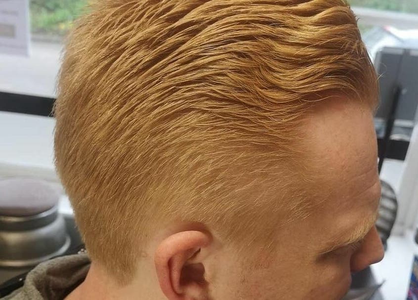 Fresh haircut at Chapps Barbershop, Southwold, England, GB showcasing sleek styling.