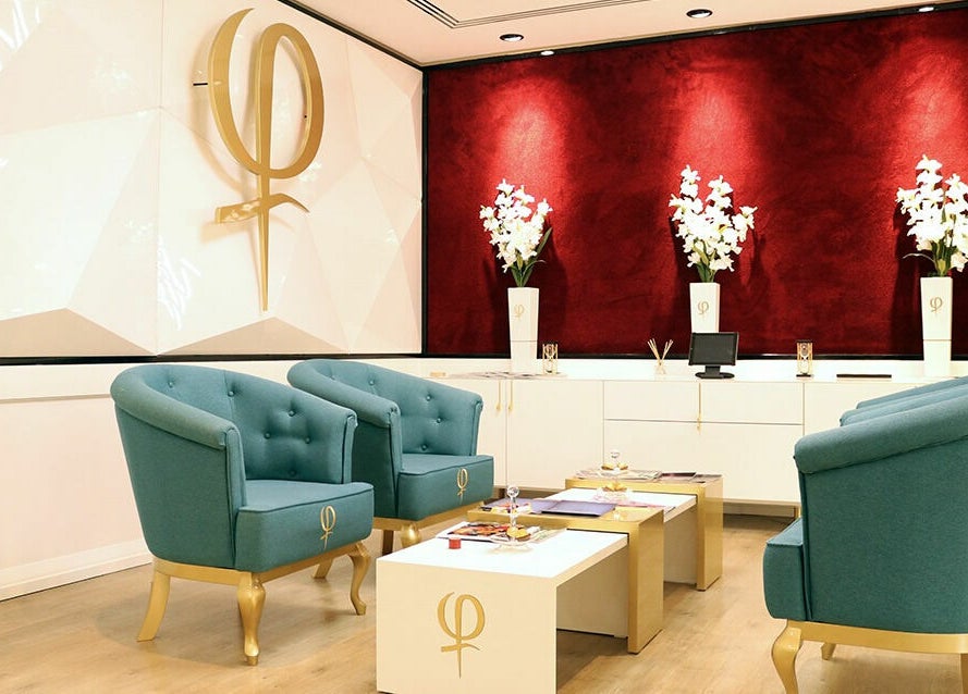 Luxurious seating at Phi Studio Dubai, Dubai, Dubai, AE. Plush chairs and elegant decor create a welcoming ambiance.