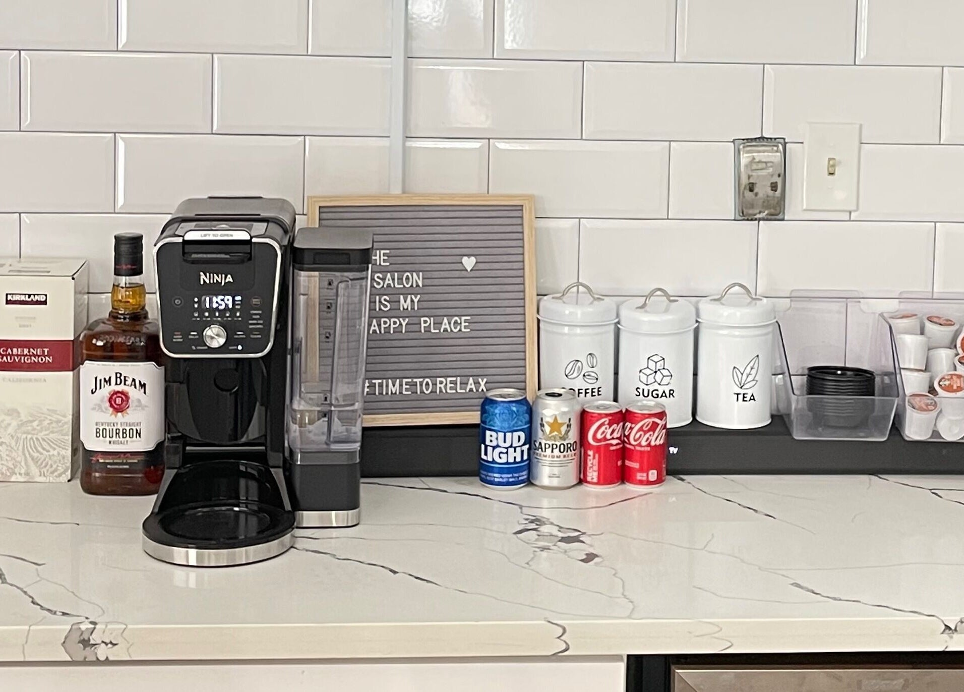 Beverage station with drinks and coffee at The Xperience Cut, New Orleans, Louisiana, US.