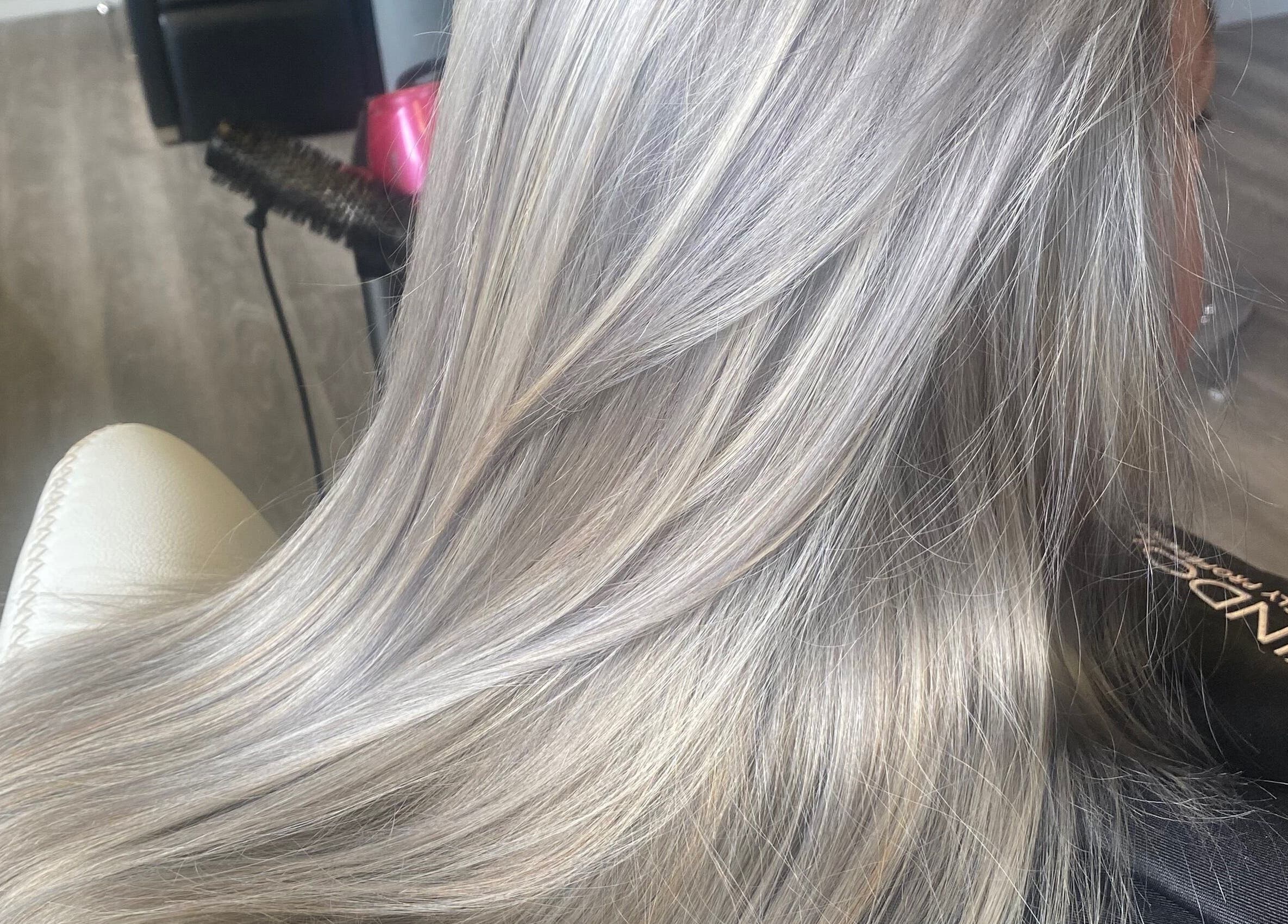 Silky silver hair styled at The Grand Salon, Cahir, County Tipperary, IE, showcasing expert beauty service.