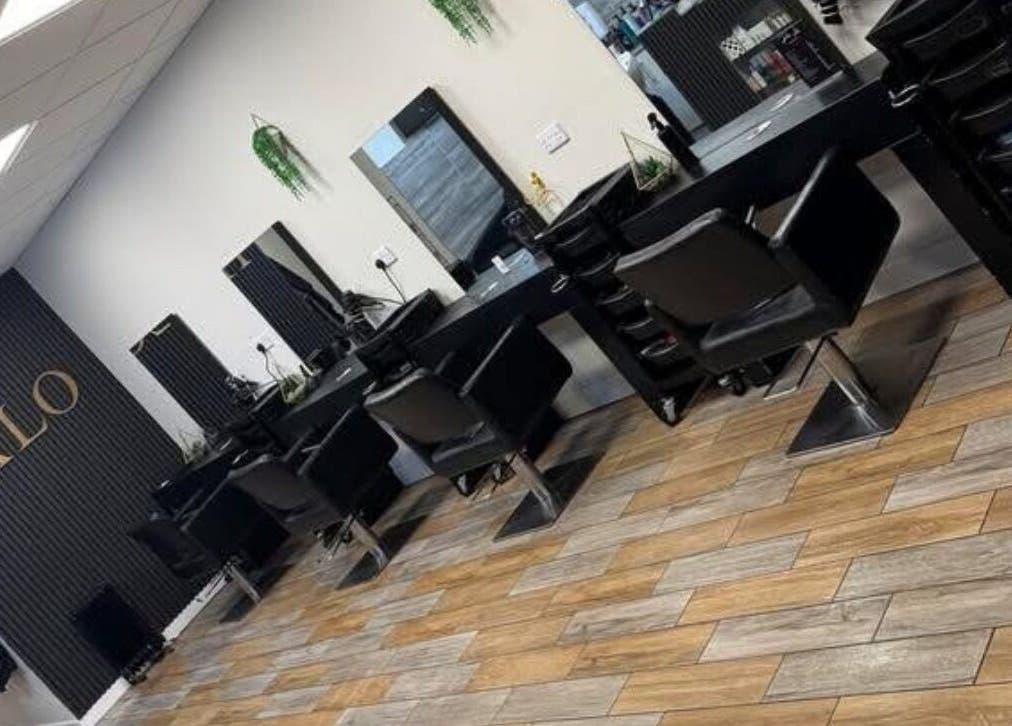 Modern salon chairs and mirrors at Halo Hair & Beauty in Wythenshawe, England, GB.