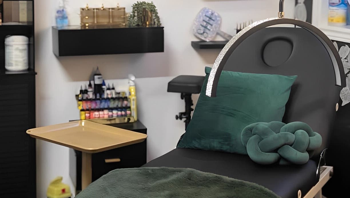 Comfortable treatment room at She Studios, London, Ontario, CA, featuring plush decor and modern equipment.