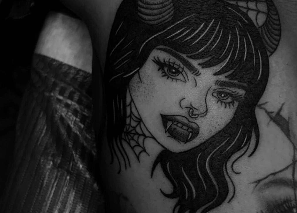 Intricate vampire-themed tattoo art at She Studios, London, Ontario, CA, showcasing gothic style.
