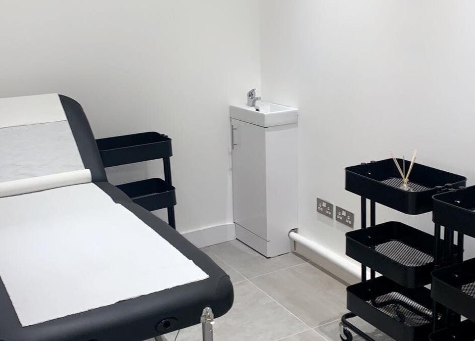 A modern treatment room at Bespoke Brows & Aesthetics, Shirley, England, GB featuring a comfortable therapy bed.